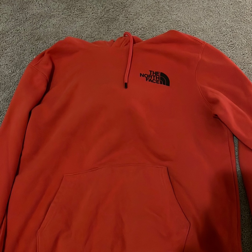 red north face hoddie